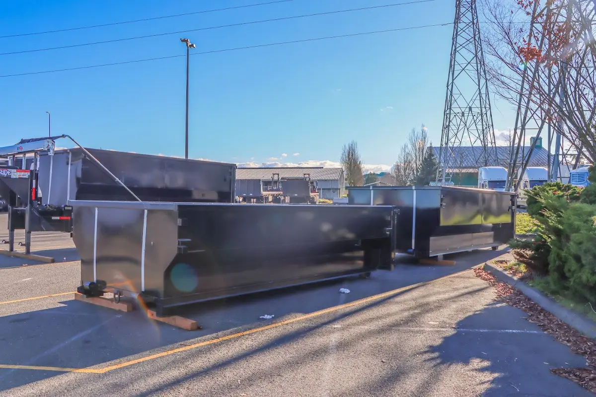 Roll-off dumpster ready for waste disposal at job site for Estate Cleanout Dumpster Rental in Bridge City